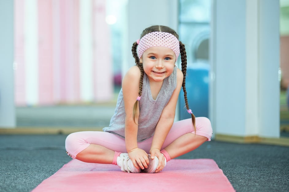 Kid doing fitness exercises